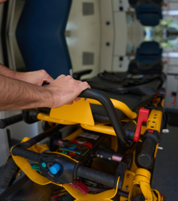 wheelchair, crutches and a white van