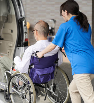  A caregiver who puts an elderly person in a long-term care taxi